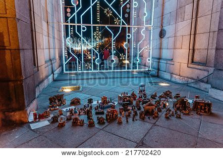 Madrid, Spain - December 8, 2017: Nativity scenes placed by anonymous people in Puerta de Alcala as the Mayor of Madrid, Manuela Carmena , has not allowed the traditional Nativity Scene