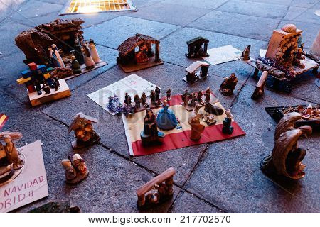 Madrid, Spain - December 8, 2017: Nativity scenes placed by anonymous people in Puerta de Alcala as the Mayor of Madrid, Manuela Carmena , has not allowed the traditional Nativity Scene
