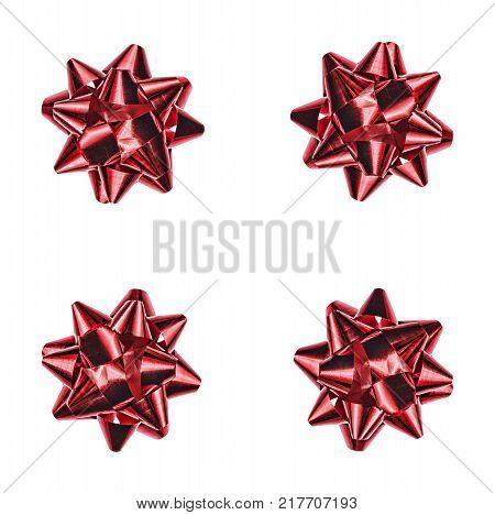 A holiday symbol, an element of decor. Red bow isolated on white background.