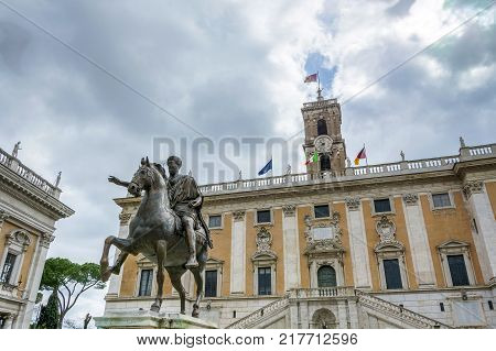 the bronze equestrian statue of Marco Aurelio (Marcus Aurelius) with the Campidoglio Palace in the distance in Rome