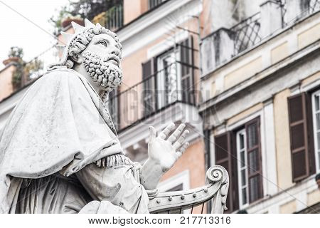 King David Statue , detail of the base of the Column monument to the Immaculate Conception, by Adamo Tadolini in 1856 located in Piazza di Spagna in Rome. italy