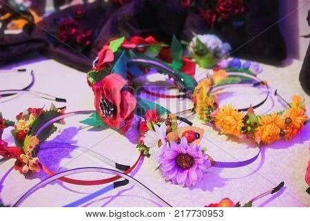 wreaths of poppies and other flowers background