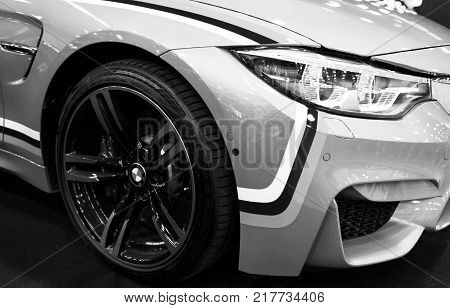 Sankt-Petersburg Russia July 21 2017: Front view of a BMW M4 sports car. M Performance Edition. Car exterior details. Black and white. Photo Taken at Royal Auto Show July 21