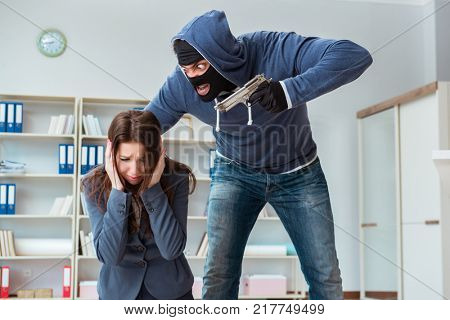 Criminal taking businesswoman as hostage in office