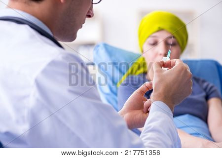 Cancer patient visiting doctor for medical consultation in clinic