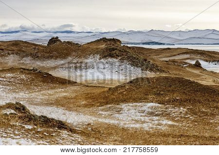 View above big beautiful lake and mountain in winter, Baikal lake, Russia, Siberia
