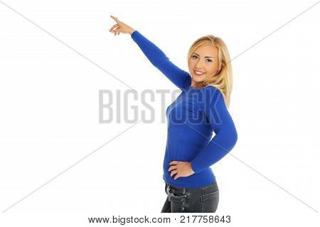 The portrait of young woman showing on side.