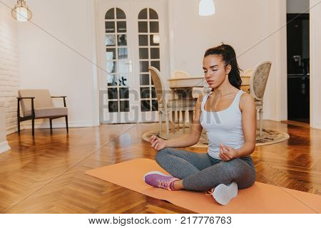 Fit Young Woman Exsercise In The Room