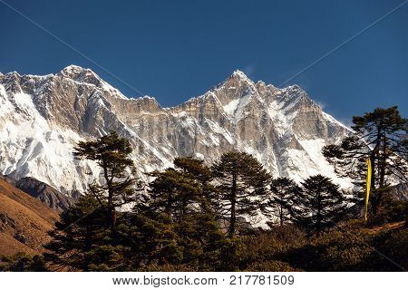 Mount Everest epic aerial wide shot of snowcapped cold rocky mountains.