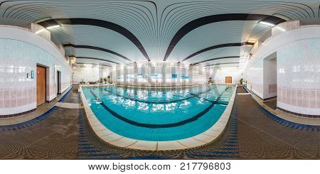 MINSK BELARUS - JULY 11 2013: Panorama in interior of swimming pool in sports complex. Full 360 by 180 degree seamless spherical panorama in equirectangular projection. Skybox for AR VR content