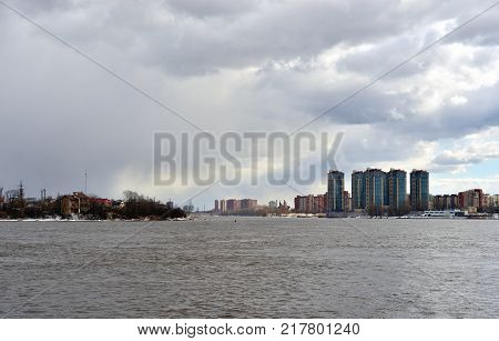 View of Neva river and microdistrict Ribatskoe on the outskirts of St. Petersburg Russia.