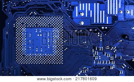 Blue circuit board background of computer motherboard Circuit board background. Close up of a printed red computer circuit board