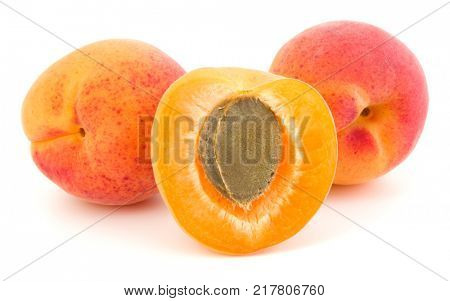 three apricot fruit isolated on white background cutout