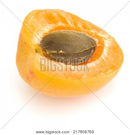 One apricot half isolated on white background cutout