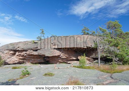 Rocks with strange shape and blue sky on Aland Autonomous province of Finland