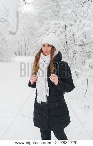 Beautiful Young Girl In A White Winter Forest