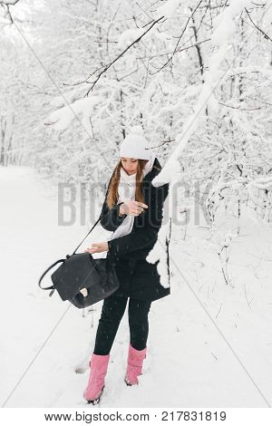 Beautiful Young Girl In A White Winter Forest