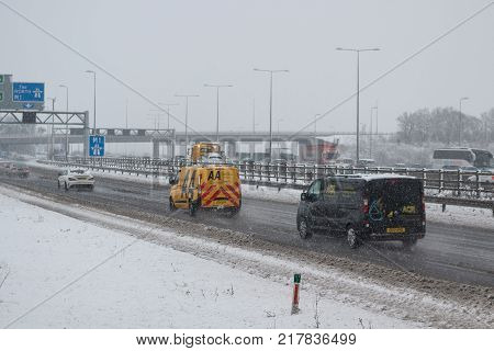 Hemel Hempstead UK - December 10 2017:Traffic on the British motorway M1 during the snowstorm