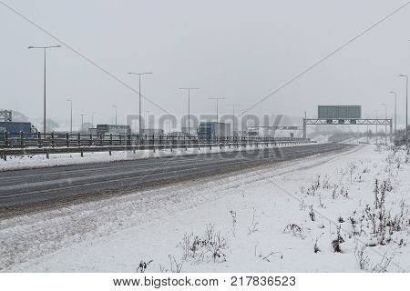 Hemel Hempstead UK - December 10 2017:Traffic on the British motorway M1 during the snowstorm