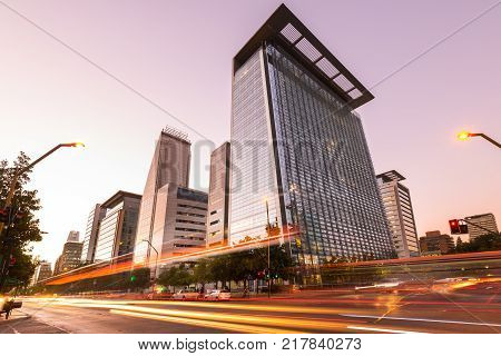 Santiago Region Metropolitana Chile - February 07 2017: The Apoquindo Avenue one of the most important streets in the city for the location of high profile corporate and office buildings.