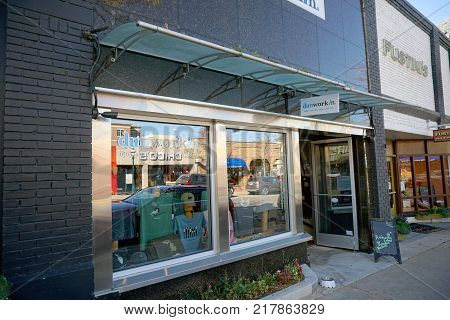 PETOSKEY, MICHIGAN / UNITED STATES - OCTOBER 18, 2017: Dunworkin offers informal, leisure-time clothing for sale, on Howard Street in downtown Petoskey.