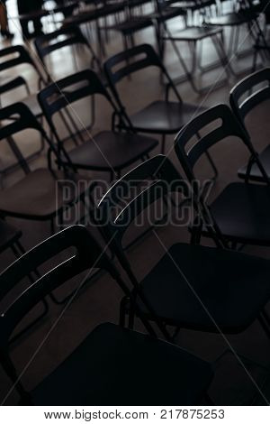conference hall with Black empty chairs in row
