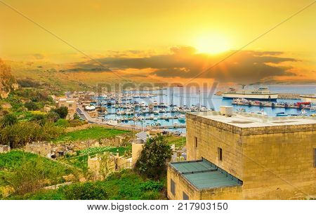 Beautiful panorama of Gozo island in colorful light at sunrise in Malta Europe