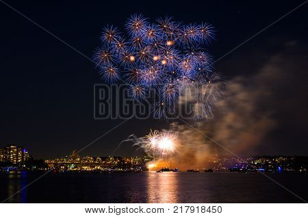 Celebration multicolored fireworks copy space. Canada Day holidays salute. New Year celebration colorful fireworks.