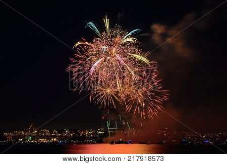 Celebration multicolored fireworks copy space. Canada Day holidays salute. New Year celebration colorful fireworks.