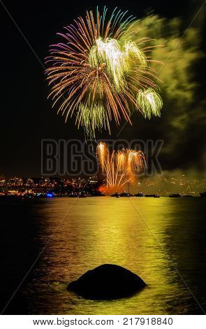 Celebration multicolored fireworks copy space. Canada Day holidays salute. New Year celebration colorful fireworks.