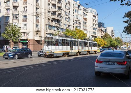 Bucharest Romania October 10 2017 : The city tram goes along the Boulevard Corneliu Coposu in Bucharest city in Romania