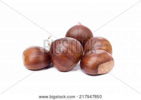 Fresh traditional chestnuts isolated on white background
