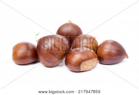 Fresh traditional chestnuts isolated on white background