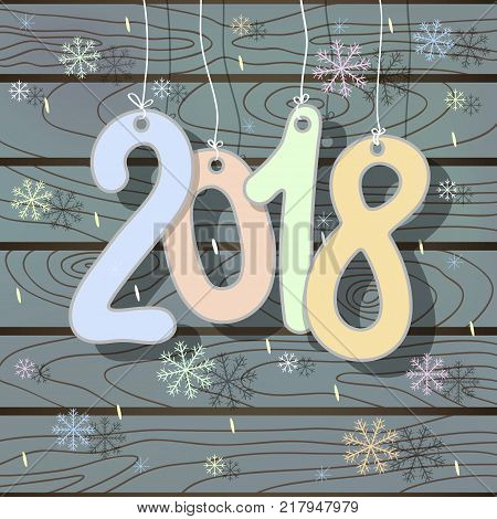 Christmas soft card with ribbons hanging on ribbons 2018. Vector illustration of a New Year on a blue gray tree background.