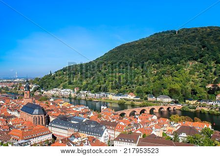 Cityscape of Heidelberg in Germany with a bridge on the Neckar river