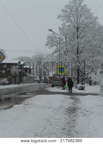 city in snow, winter has come.Snow-covered streets.
