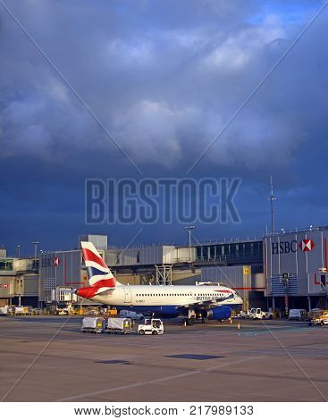 Gatwick United Kingdon - September 20: 2017: British Airways Jet Airliner being loaded in an Autumn storm at Gatwick Airport.