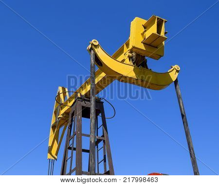 The Pumping Unit As The Oil Pump Installed On A Well. Equipment Of Oil Fields.