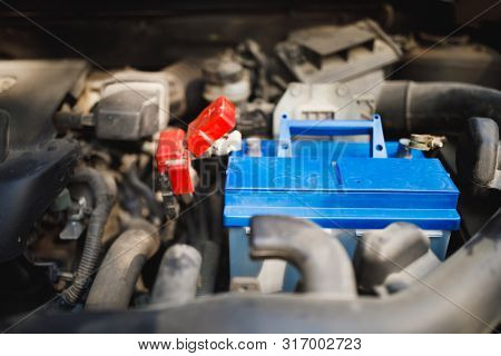 new lead-acid automotive electric battery replacement in old car