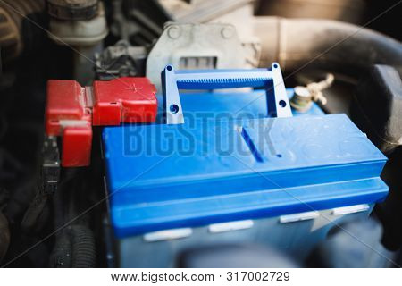 new lead-acid automotive electric battery replacement in old car
