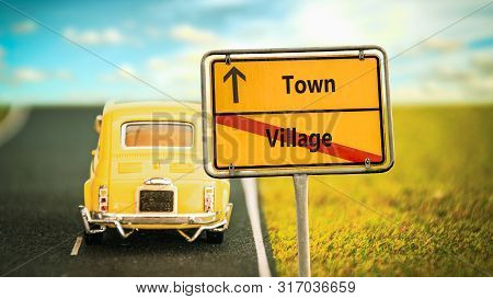 Street Sign Town Versus Village