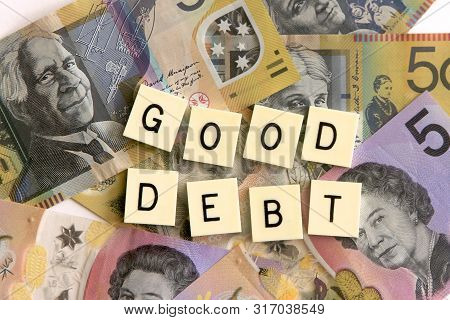 Good Debt Signage On A Background Of Austr Alian Dollar Notes.