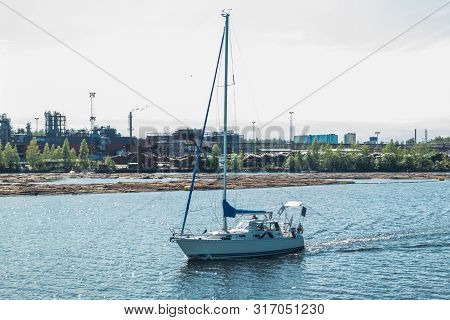 Lappeenranta, Finland - August 7, 2019: Yacht And Upm Factory In Lappeenranta, Finland