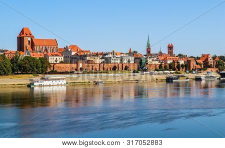 Panoramic View Of Torun City And Wisla (vistula) River In Sunny Day. Poland, Summer 2019