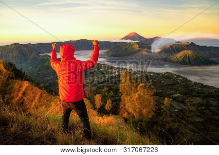 Traveller Success For Treking To Top Of Mountain To See A Sunrise For Bromo Vocano In Java Island, I