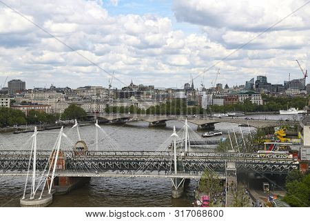 London, Great Britain -may 22, 2016: Hungerford Bridge And Waterloo Bridge Across The Thames