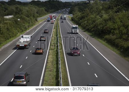 Editorial Swansea, Uk - August 12, 2019: Free Flowing Traffic On The M4 Motorway At Junction 47 In S