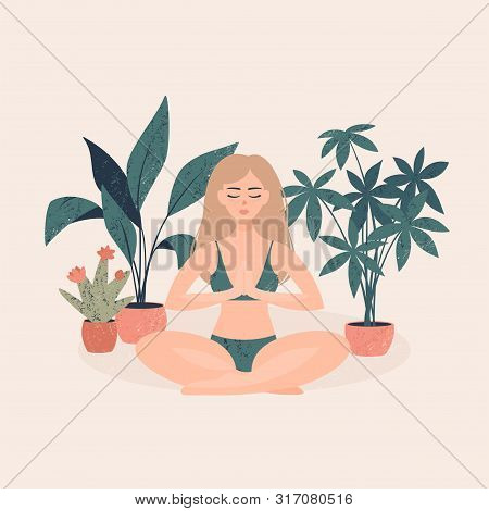 Blonde Girl In A Green Bathing Suit Sitting In A Lotus Position Surrounded By Pots Of Tropicalplants