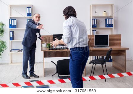 Forensic investigator investigating theft in the office