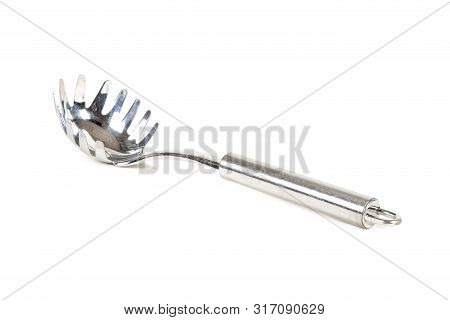 A Metal Pasta Server Isolated On A White Background